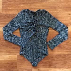 Tie up gray bodysuit, very stretchy material.